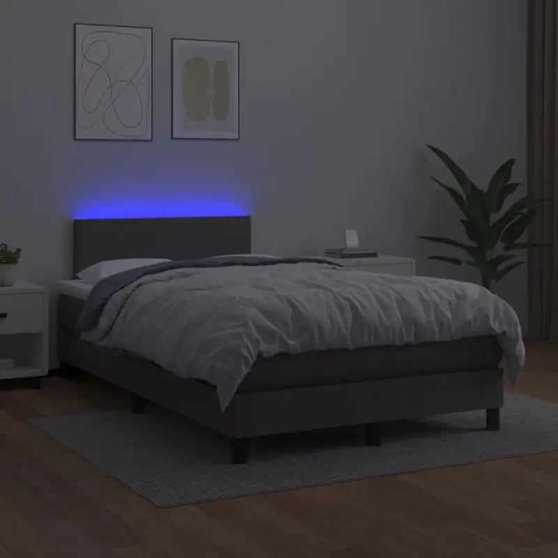 Grijze boxspring met matras en LED voor een rustgevende slaapkamer - Bedden & bedframes