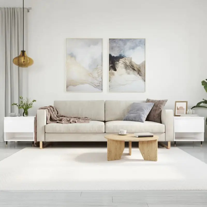 Salontafel met bewerkt hout en metalen poten voor stijlvolle woonruimte - Salontafels