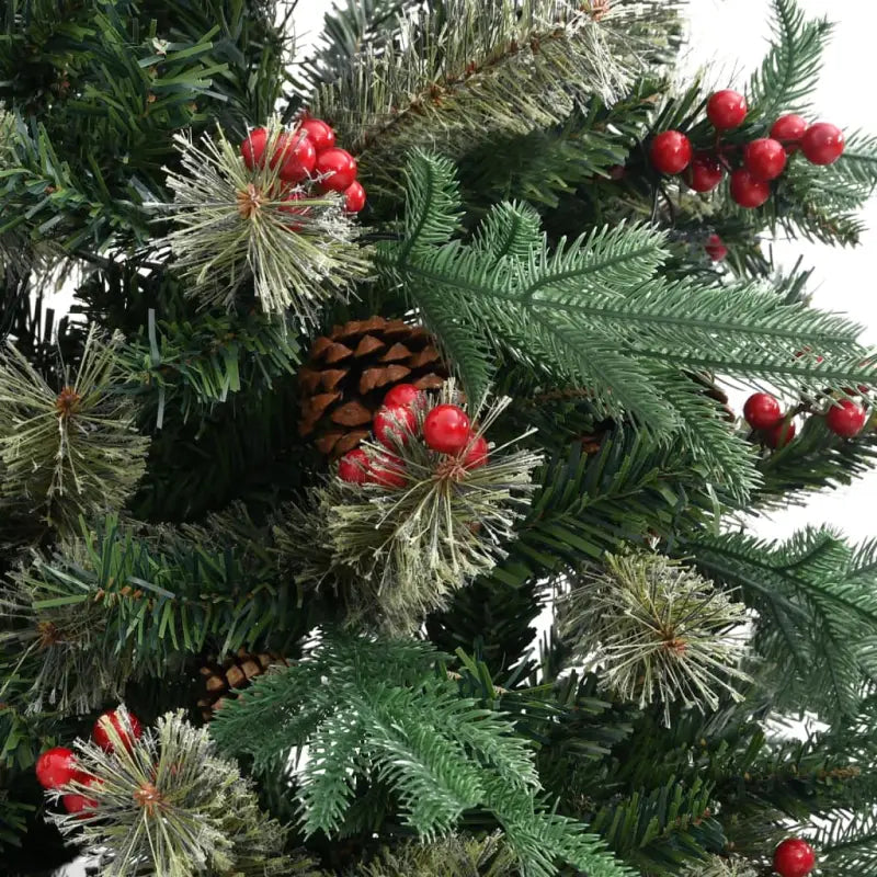 Scharnierende kerstboom met takken en rode bessen voor feestdagen sfeer - Kerstbomen