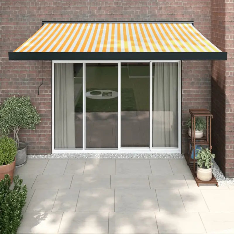 Uittrekbare luifel in gepoedercoat aluminium voor je terras - Geel en wit (zwart frame) / 3 x 2.5 m / 1 - Zonwering