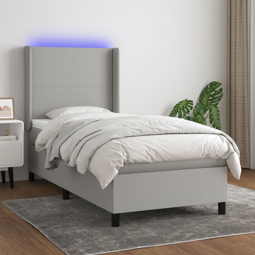 vidaXL Boxspring met matras en LED stof crèmekleurig 140x200 cm