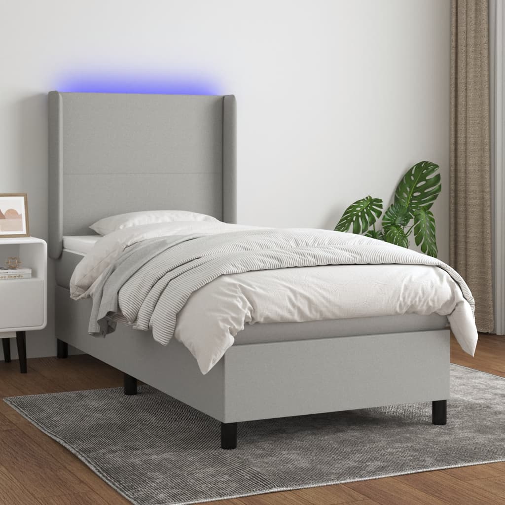 vidaXL Boxspring met matras en LED stof crèmekleurig 140x200 cm