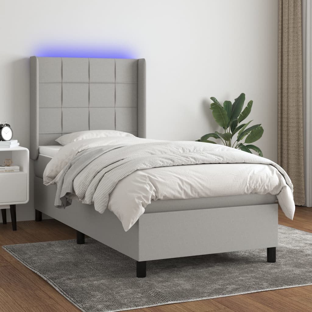 vidaXL Boxspring met matras en LED stof crèmekleurig 140x200 cm