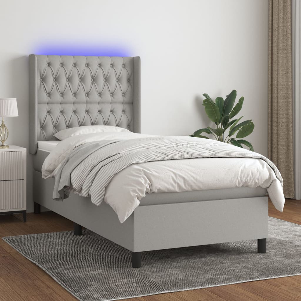 vidaXL Boxspring met matras en LED stof crèmekleurig 140x200 cm
