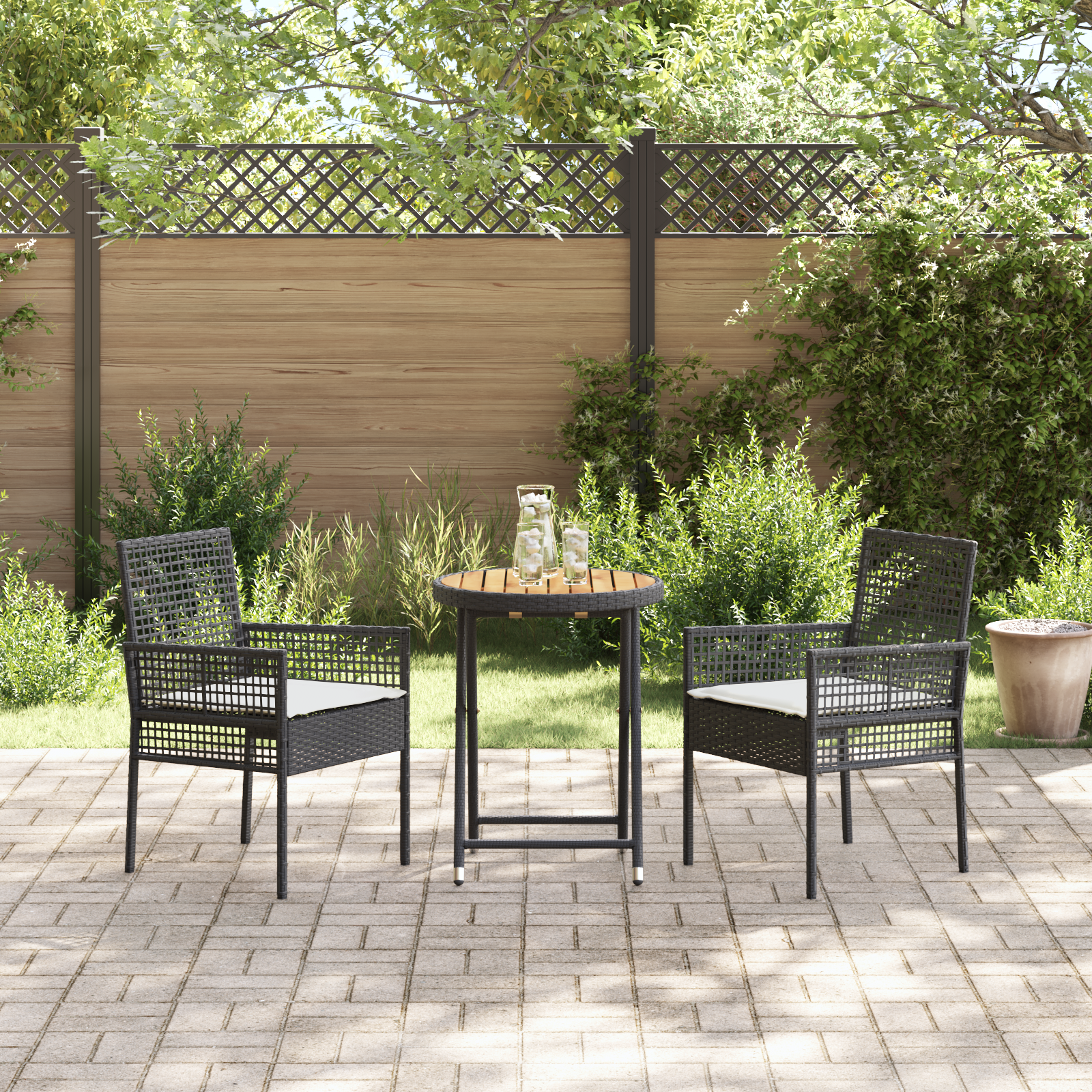 vidaXL 3-delige Bistroset voor in de tuin met kussens Zwart Poly Rattan