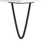 Eettafel met bewerkt hout en metalen poten voor een elegante woonkamer - Salontafels