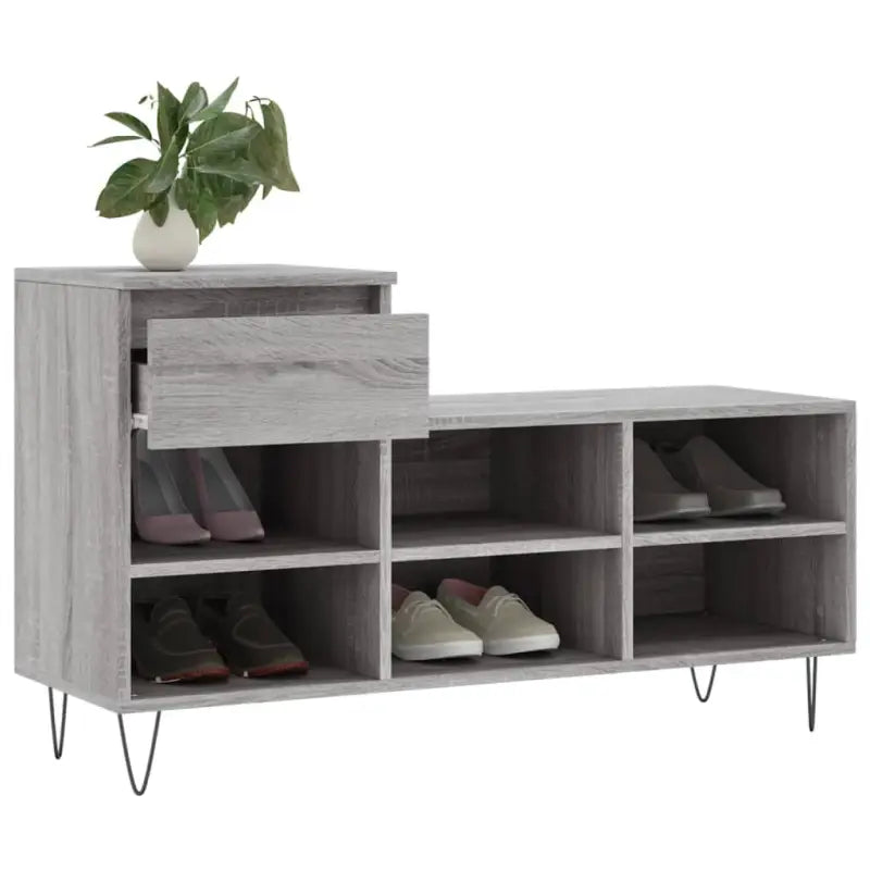 Elegante schoenenkast van bewerkt hout met metalen poten voor een opgeruimde ruimte - Schoenenrekken