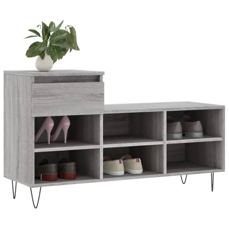 Elegante schoenenkast van bewerkt hout met metalen poten voor een opgeruimde ruimte - Schoenenrekken
