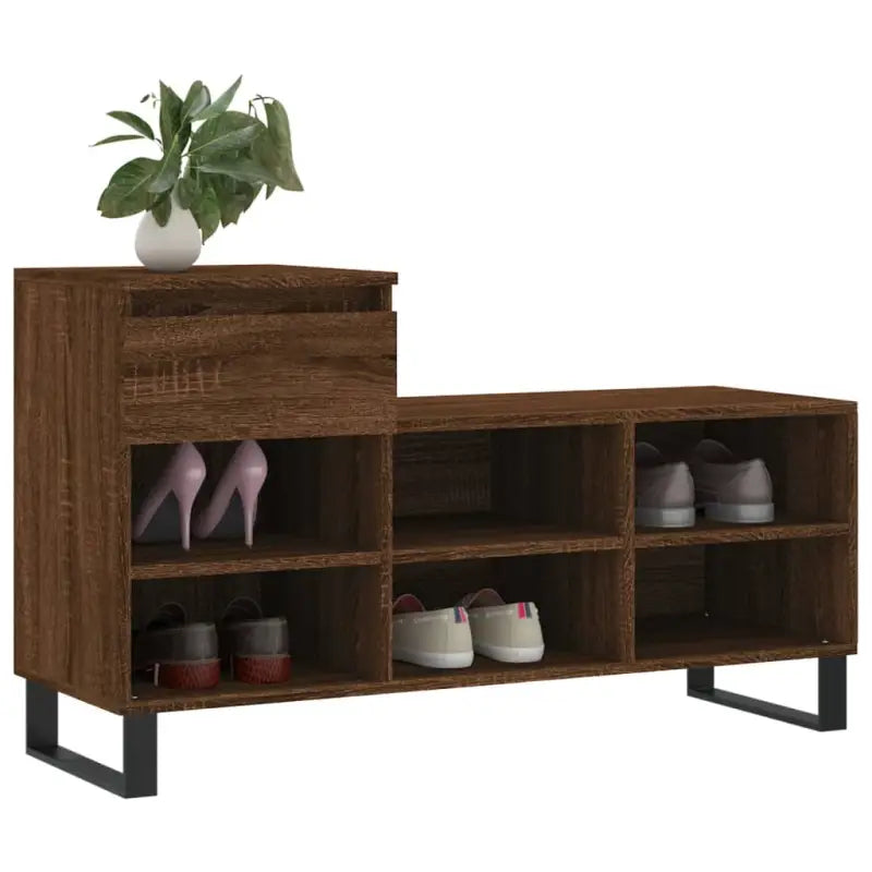 Elegante schoenenkast van bewerkt hout met metalen poten voor een opgeruimde ingang - Schoenenrekken