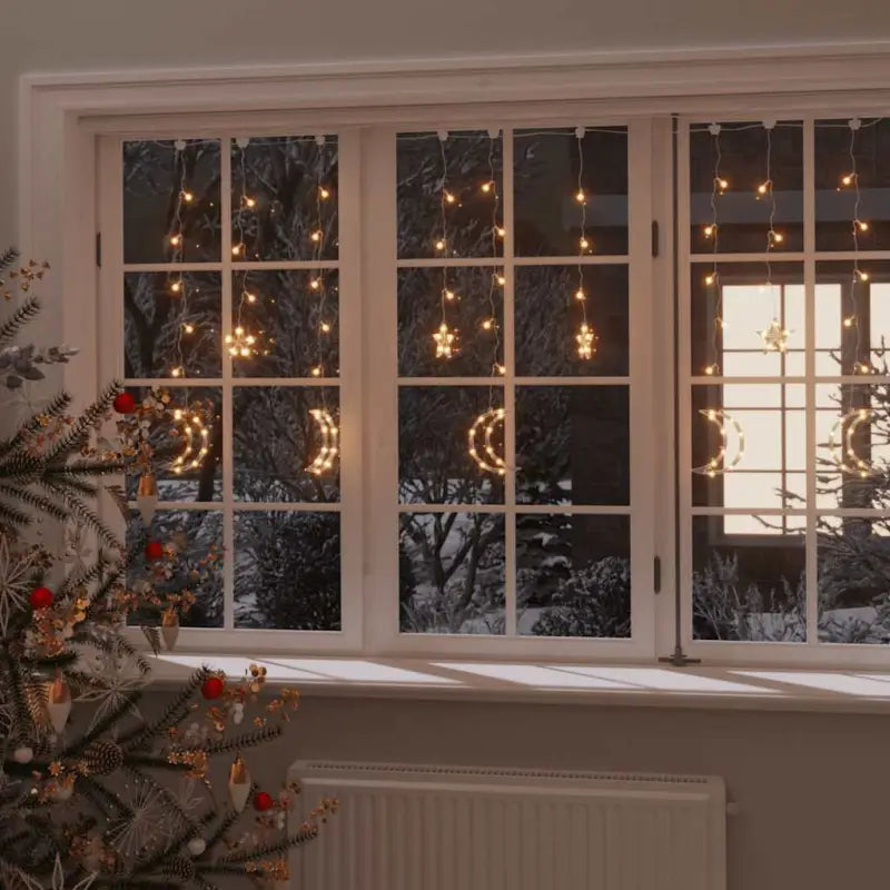 Energiebesparende LED’s kerstverlichting met sterren en manen en lange verlengkabel - Warmwit / 345 led / 1