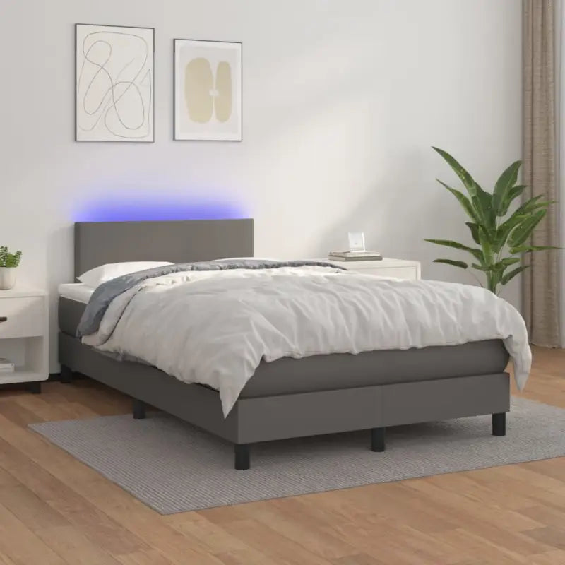 Grijze boxspring met matras en LED voor een rustgevende slaapkamer - Bedden & bedframes