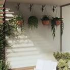 Hangende plantenbakken van gepoedercoated staal voor elegance en duurzaamheid - Plantenkooien & -steunen