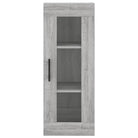 Hoge kast met ijzeren poten en bewerkt hout voor een trendy interieur - Dressoirs & buffetkasten