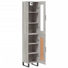 Hoge kast met ijzeren poten en bewerkt hout voor een trendy interieur - Dressoirs & buffetkasten