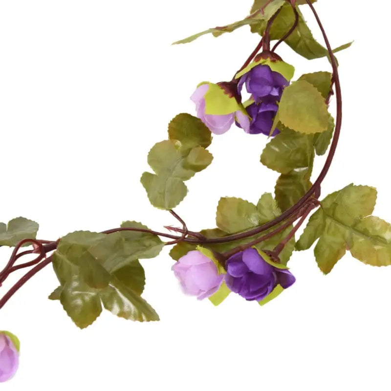 Kerstslingers met bloemen voor een romantische sfeer - Kransen en slingers