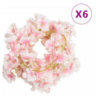 Kransen en slingers met bloemen voor een romantische feestdecoratie - Kransen en slingers