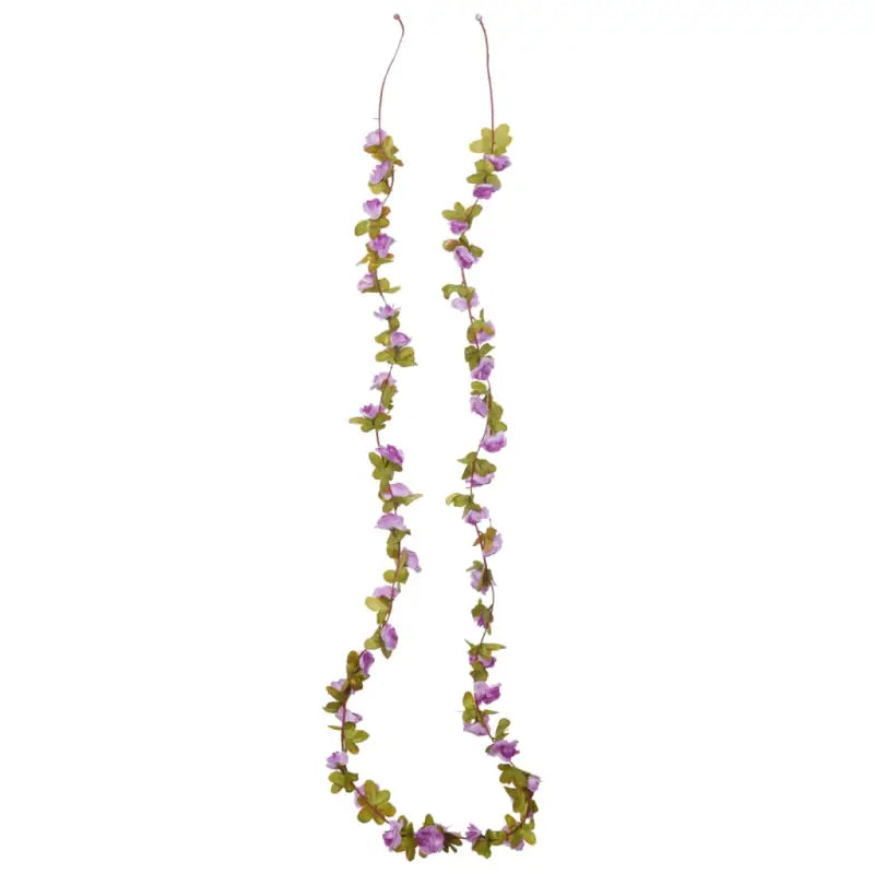 Kransen en Slingers met Bloemen voor een Romantische Kerstsfeer - Kransen en slingers
