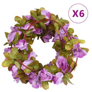 Kransen en Slingers met Bloemen voor een Romantische Kerstsfeer - Kransen en slingers