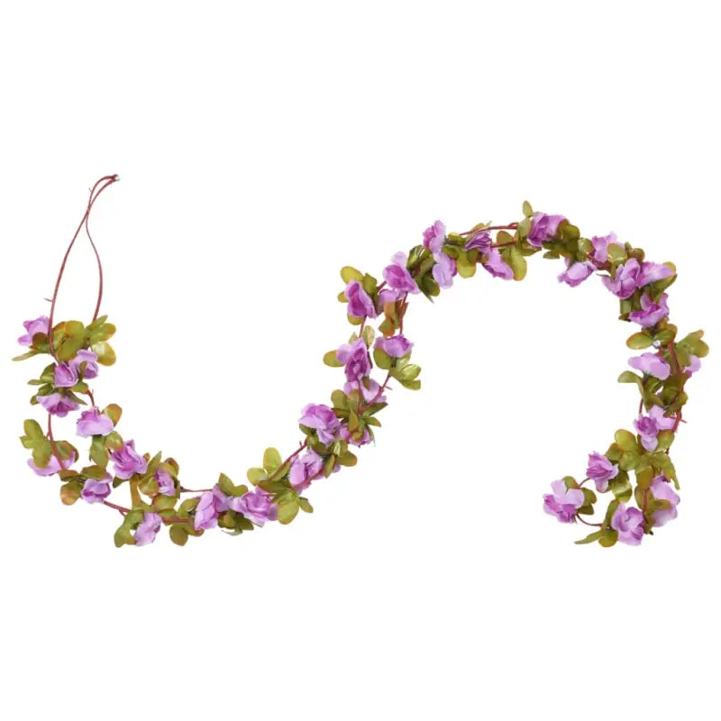 Kransen en Slingers met Bloemen voor een Romantische Kerstsfeer - Kransen en slingers