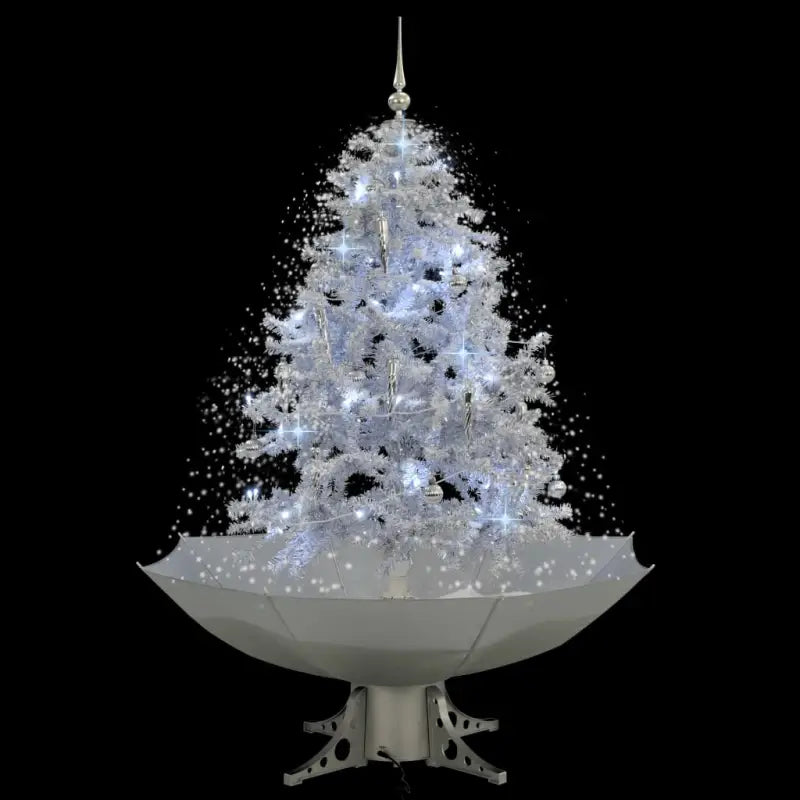 Kunstkerstboom met vallend sneeuw en levendige takken - Kerstbomen