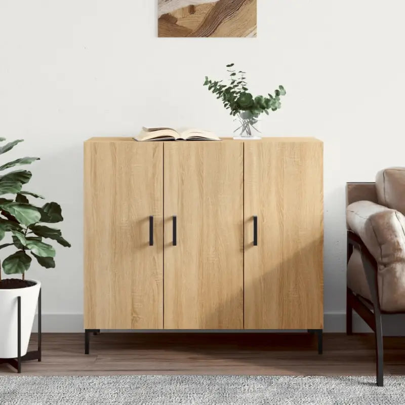 Modern dressoir met bewerkt hout en metalen poten voor een tijdloze uitstraling - Dressoirs & buffetkasten