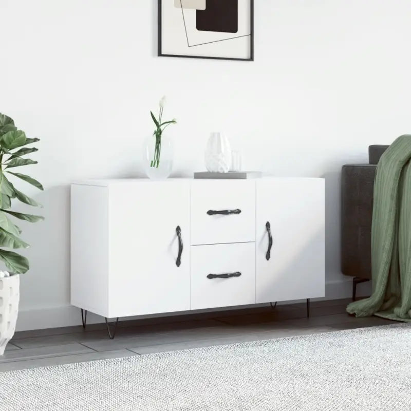 Modern dressoir met metalen poten en bewerkt hout voor een tijdloze uitstraling - Dressoirs & buffetkasten