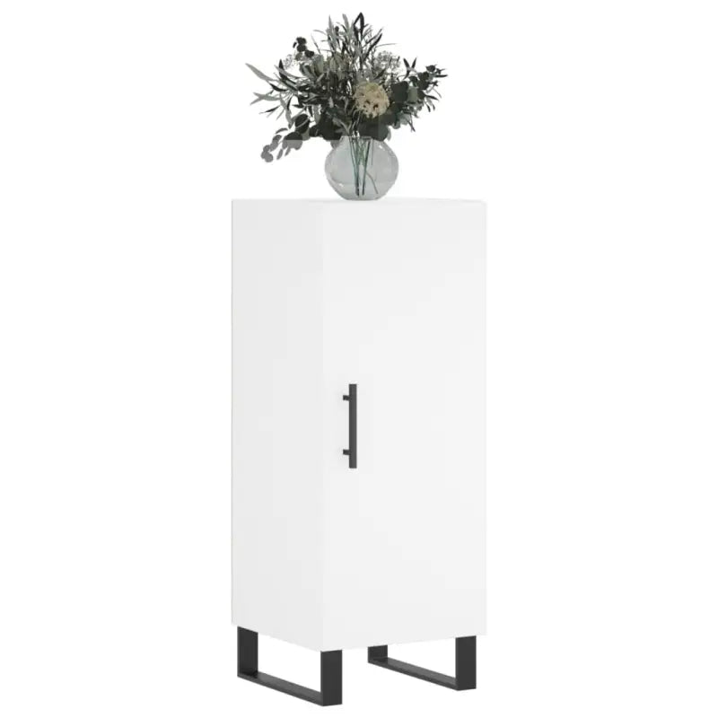 Moderne dressoir met metalen poten en bewerkt hout voor een tijdloze look - Dressoirs & buffetkasten