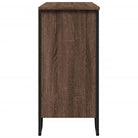 Moderne dressoir met metalen poten en bewerkt hout voor een tijdloze uitstraling - Dressoirs & buffetkasten