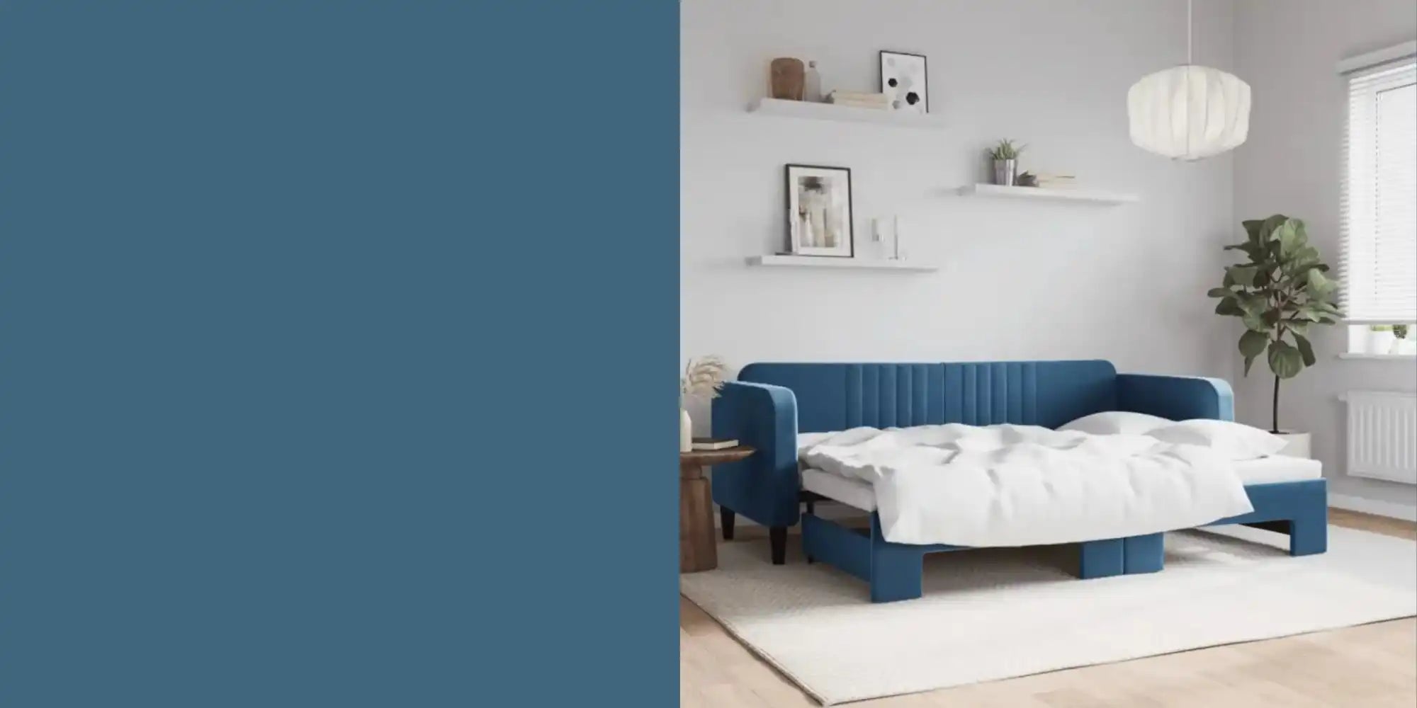 Navy blue sofa bed with white bedding unfolded into sleeping position.