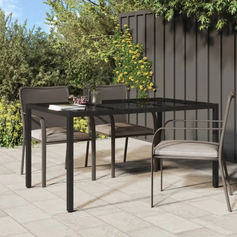 Poly rattan tuintafel met gehard glas voor een stijlvolle buitenruimte - Tuintafels