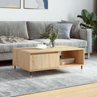 Salontafel met bewerkt hout en ijzeren poten voor stijl en functionaliteit - Salontafels