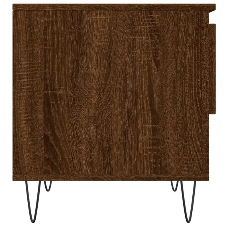 Salontafel met bewerkt hout en metalen poten voor een elegante woonkamer - Salontafels
