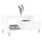 Salontafel met bewerkt hout en metalen poten voor een elegante woonkamer - Salontafels