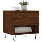 Salontafel met bewerkt hout en metalen poten voor een elegante woonkamer - Salontafels