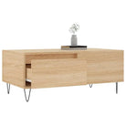 Salontafel met bewerkt hout en metalen poten voor een elegante woonkamer - Salontafels