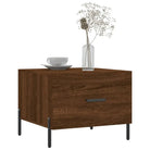 Salontafel met ijzeren poten en bewerkt hout voor een elegante woonkamer - Salontafels