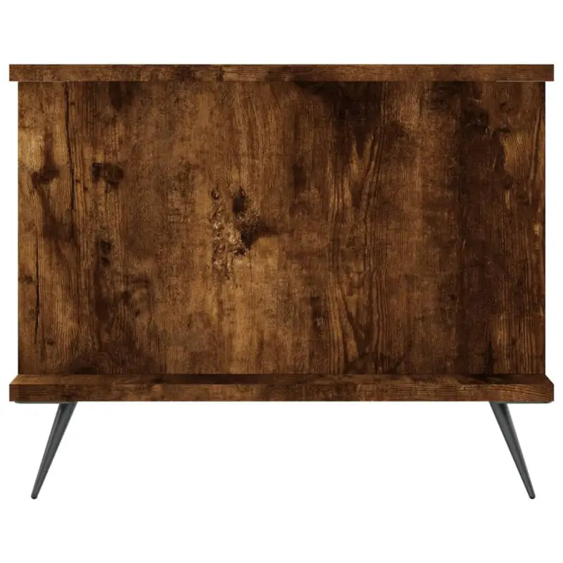 Salontafel met ijzeren poten en bewerkt hout voor een stijlvolle woonkamer - Salontafels