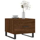 Salontafel met ijzeren poten en bewerkt hout voor een stijlvolle woonkamer - Salontafels