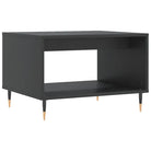 Salontafel met ijzeren poten en bewerkt hout voor elegante woonstijl - Salontafels