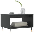 Salontafel met ijzeren poten en bewerkt hout voor elegante woonstijl - Salontafels