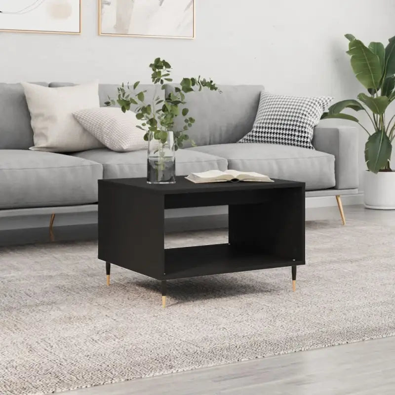 Salontafel met ijzeren poten en bewerkt hout voor elegante woonstijl - Salontafels