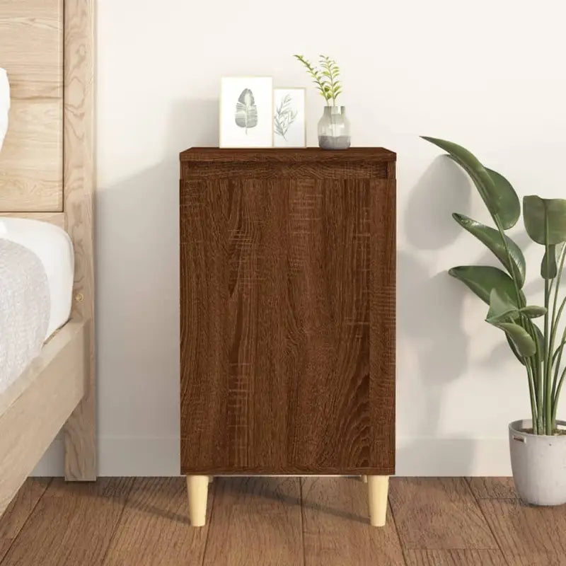 Stijlvol nachtkastje met houten poten en bewerkt hout voor een elegante inrichting - bruin eikenkleur / 1 - Nachtkastjes