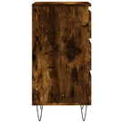 Trendy dressoir met metalen poten en bewerkt hout voor een tijdloze look - Dressoirs & buffetkasten