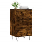 Trendy dressoir met metalen poten en bewerkt hout voor een tijdloze look - Dressoirs & buffetkasten