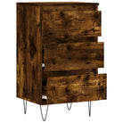 Trendy dressoir met metalen poten en bewerkt hout voor een tijdloze look - Dressoirs & buffetkasten