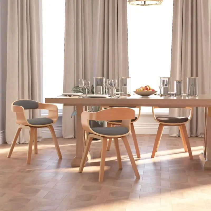 Trendy eetkamerstoelen met gebogen hout en ergonomisch ontwerp - Eetkamerstoelen