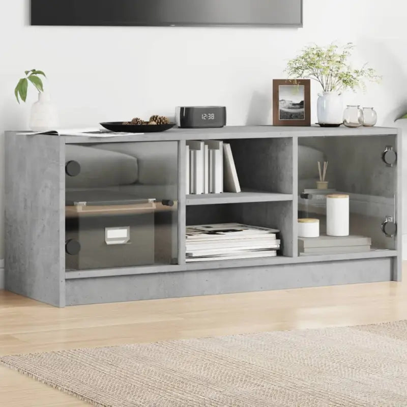Tv-meubel met glazen deuren en bewerkt hout voor een strakke look - Tv-meubels