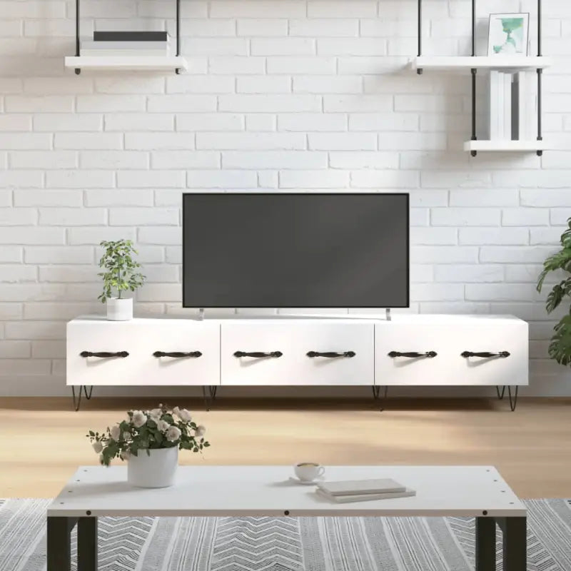 Tv-meubel van bewerkt hout met ijzeren poten voor een stijlvol interieur - Tv-meubels
