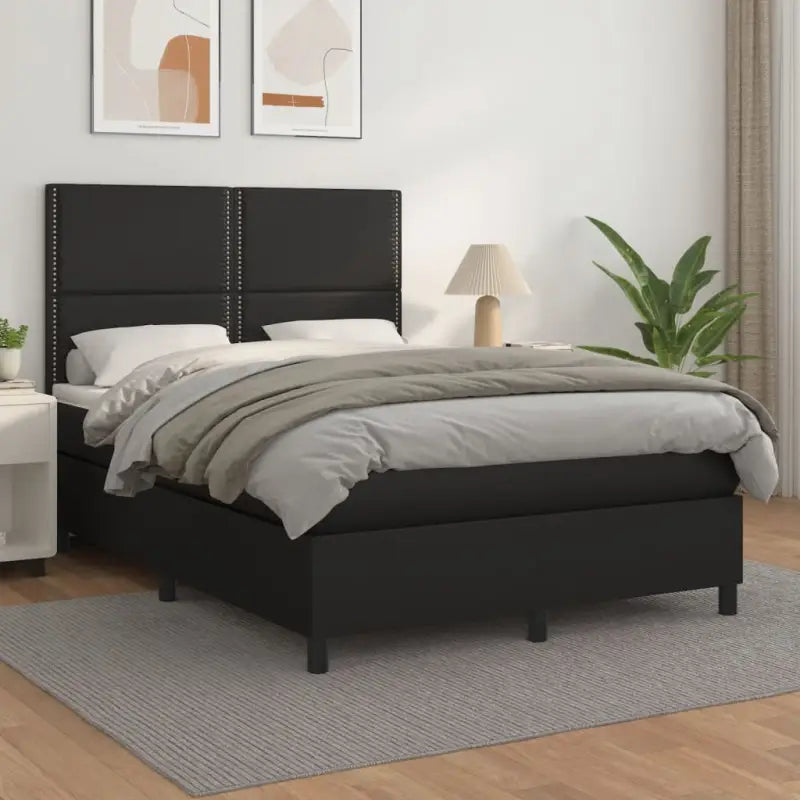 Zwart Kunstleer Boxspringbed met schuim vulling en ideale afmetingen - Zwart / 140 x 190 cm / Effen met spijkers