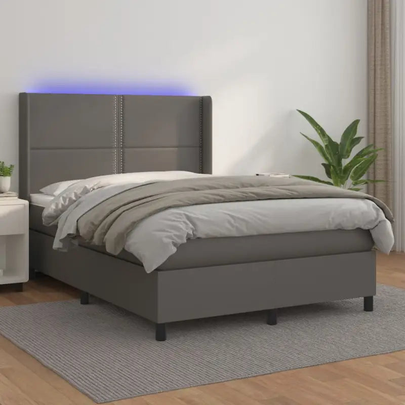 Zwart materialen boxspring met matras en LED voor een rustgevende slaapkamer - Grijs / 140 x 200 cm / Effen